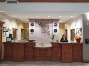 Merit Hotel & Suites
